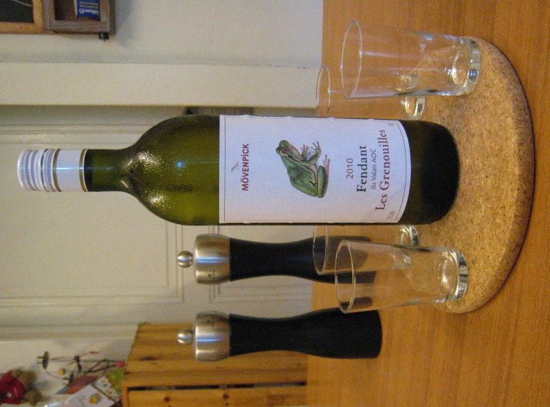 bottle of Fendant from Valais with typical fendant glasses